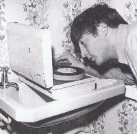 John with record player